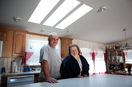 Elderly couple in their new manufactured home