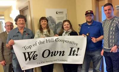 From left, Bill Norton of Norton Asset Management, Top of the Hill Secretary Barry Mulari and Vice President Linda Lord, S & M Properties President Carmella West, Top of the Hill President Charles Fairfield, and Tyler Labrie of ROC-NH.